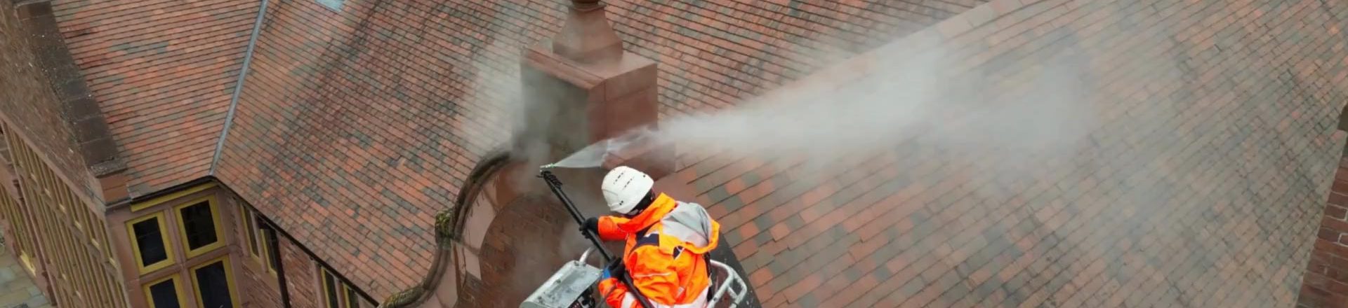 Pressure washing roof