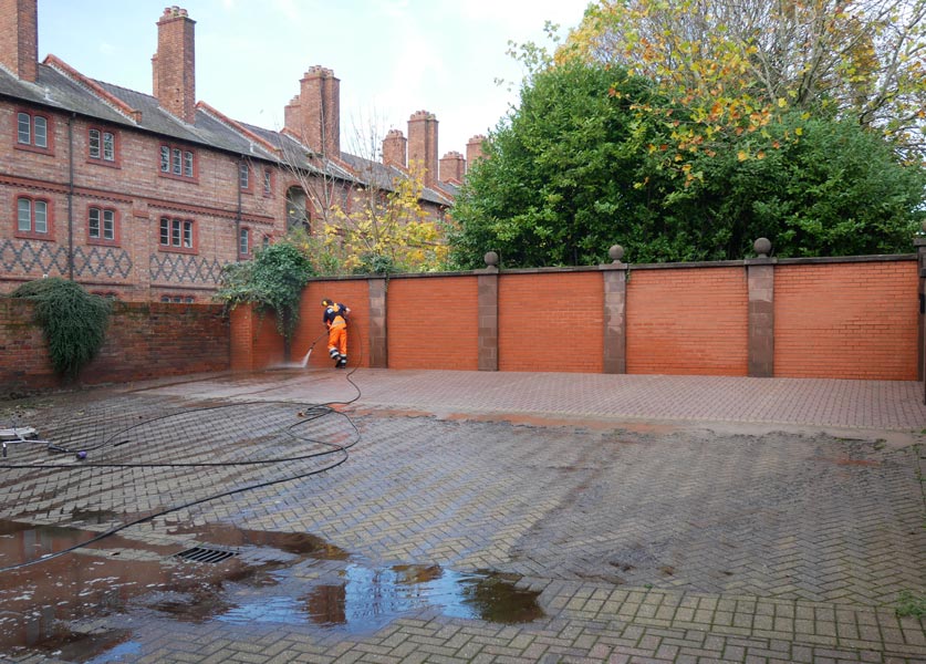 jet washing a car park